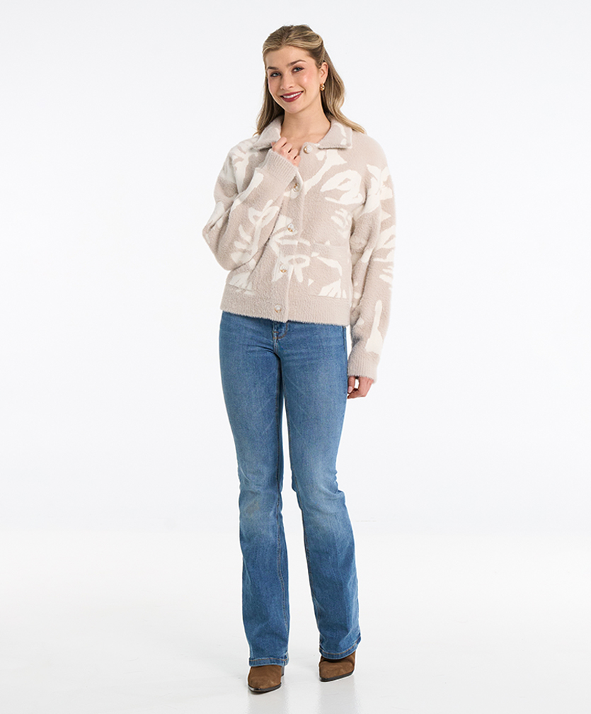 Collection de vêtements pour femme Goa par Moffi International. Manteau polar crème et blanc.